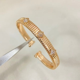 Bvlgari Tri-Color Gold Geometric Cuff Bracelet – Elegant Luxury Jewelry