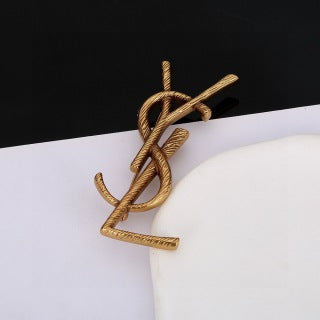 YSL Twisted Rope Monogram Gold Brooch
